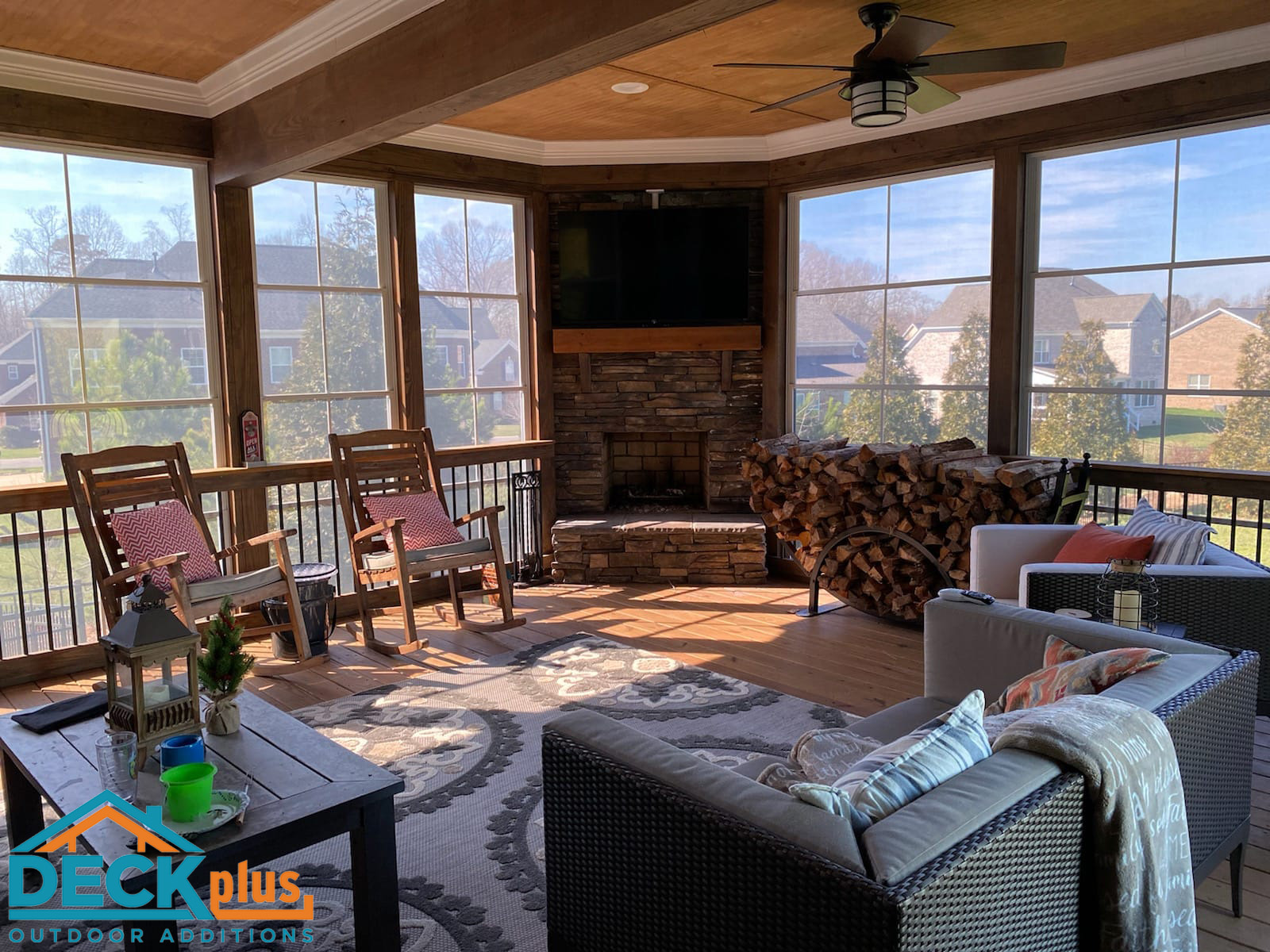 three season room with fireplace by Charlotte area porch
