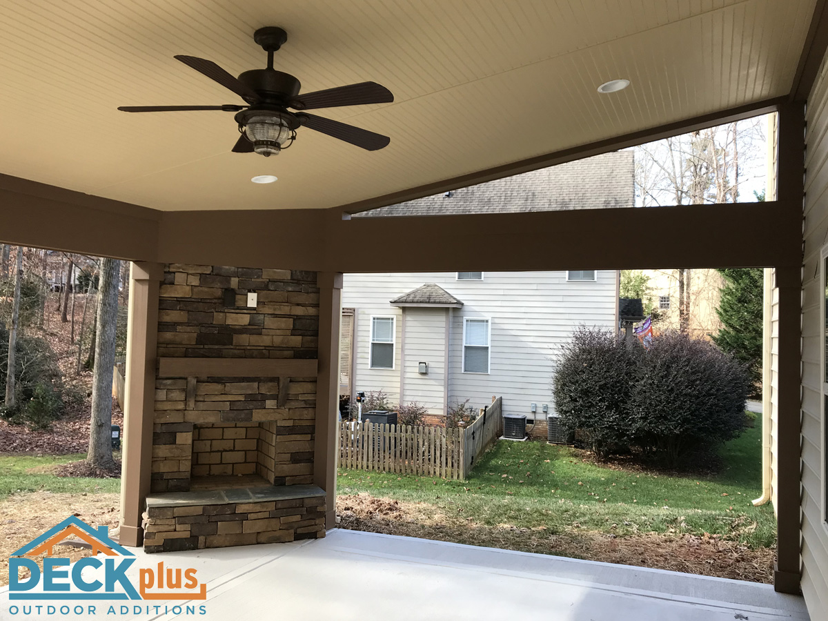 Open-porch-with-shed-roof-with-wood-burning-fireplace-in-Charlotte