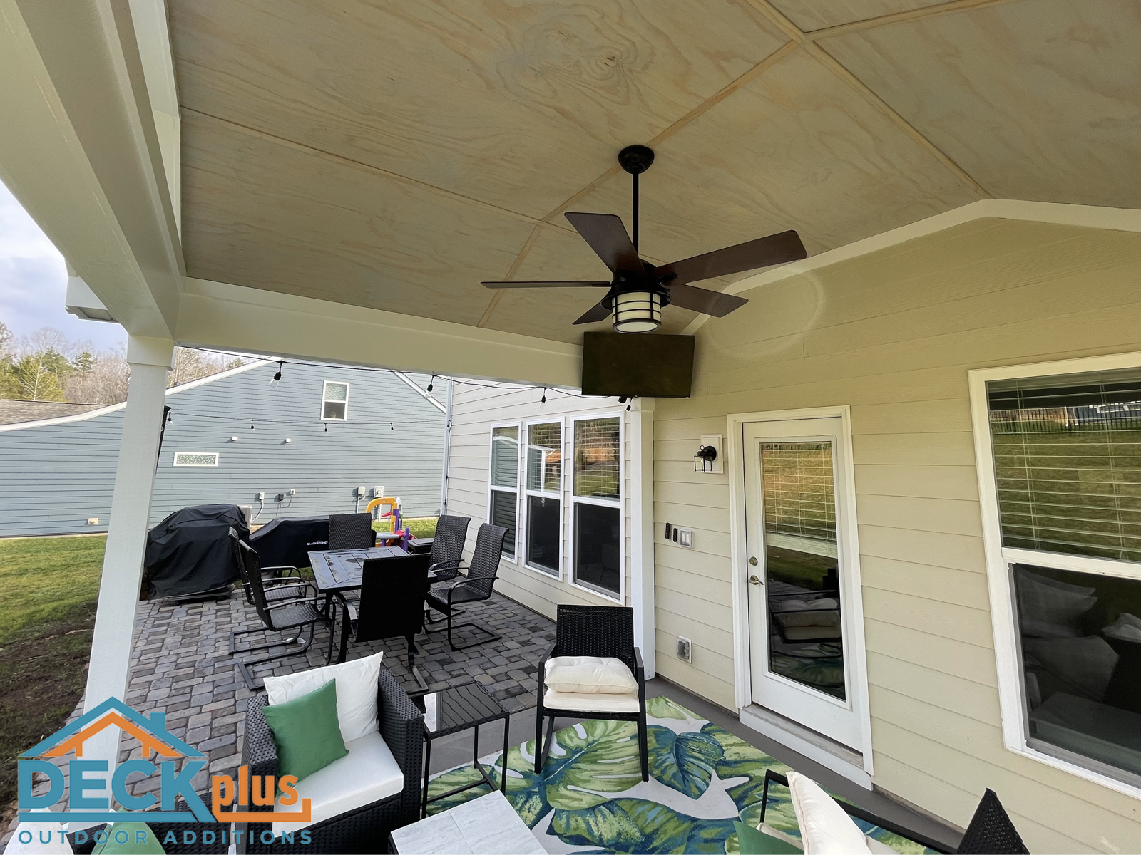 Open-porch-with-gable-roof-and-keystone-hardscape-by-Indian-Land-open-porch-builder