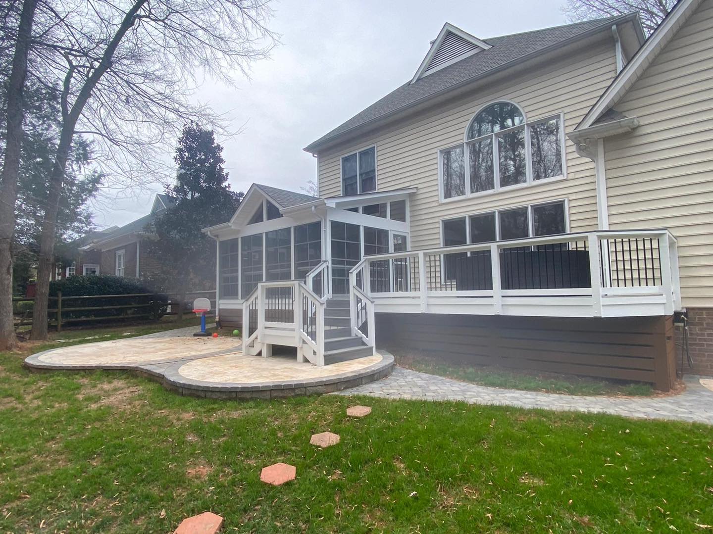 ballantyne 3 season room with patio and trex deck