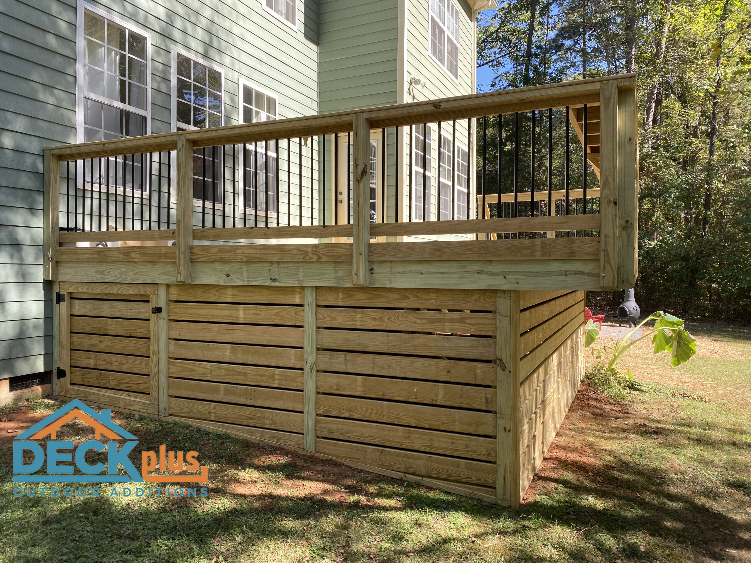 Pressure-treated-wood-deck-with-solid-board-skirting-in-Stallings-NC