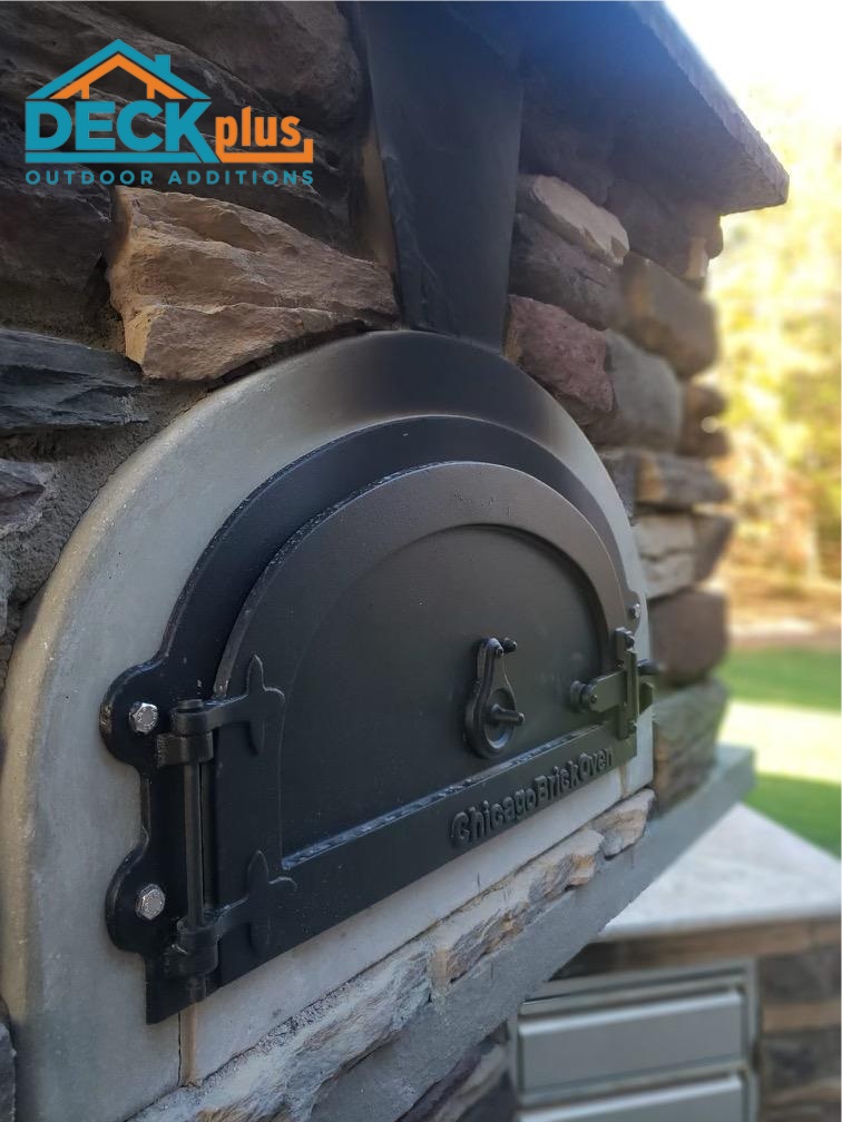 pizza oven detail on matthews outdoor fireplace by deck plus