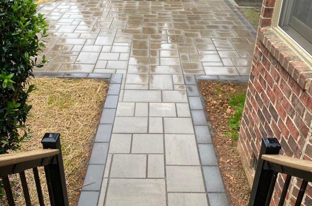 A two-toned paver patio and walkway